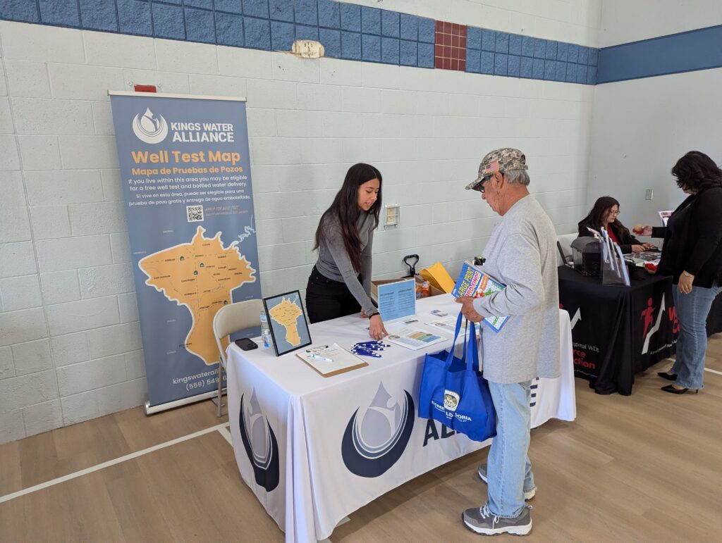 Emma Volunteering with Kings Water Alliance at an outreach event